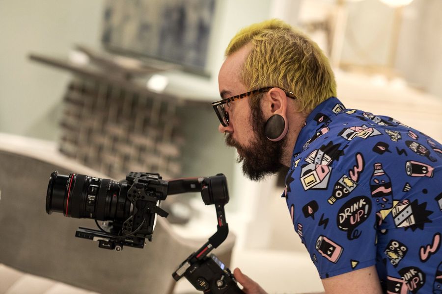 A Go Forth Marketing camera operator lining up a shot on a cinema camera